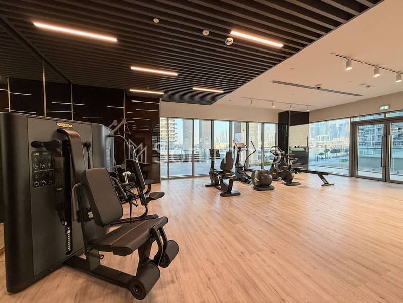 Canal-Front 2BR | Spacious Layout | Prime Location - Image 14