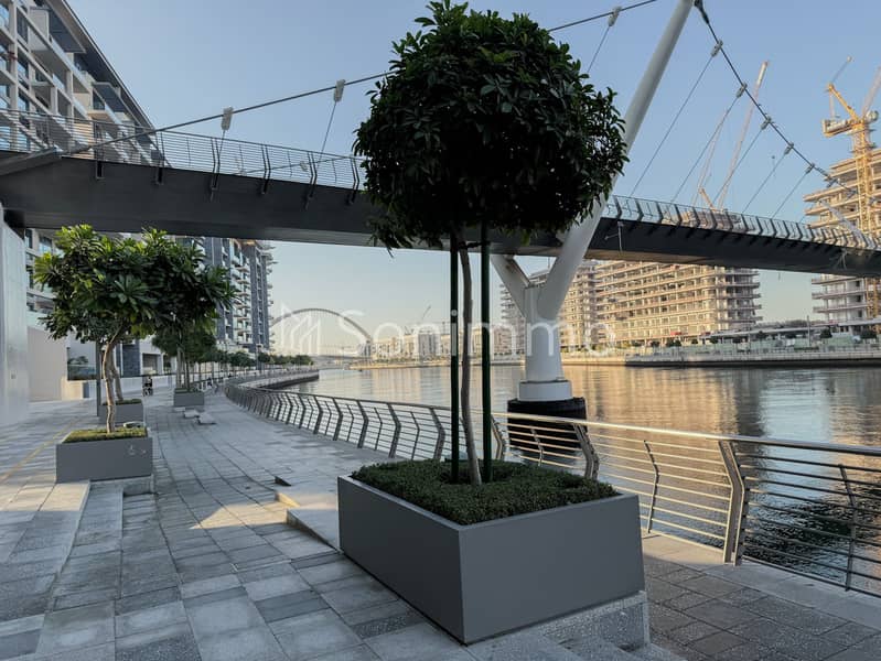 Canal-Front 2BR | Spacious Layout | Prime Location - Image 15