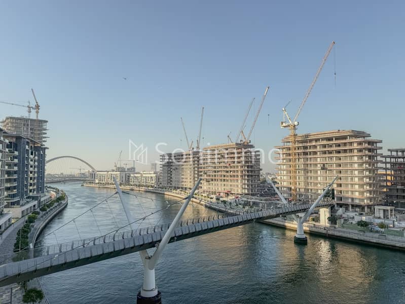 Canal-Front 2BR | Spacious Layout | Prime Location - Image 17