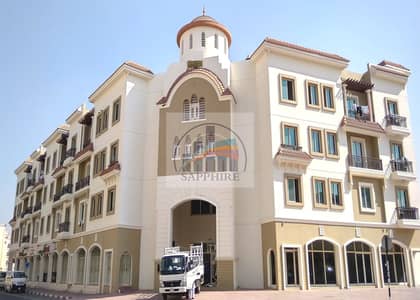 Shop para en Alquiler en International City, Dubai - Building. jpg