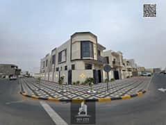 Luxury villa with electricity and water in Al Zahia, 5 master bedrooms, front setback, corner location on two streets, freehold ownership for all nati