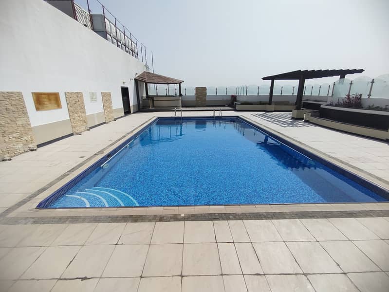 FULLY FURNISHED 2BHK CHILLER FREE FAMILY BLD PRIME LOCATION GYM POOL PARKING MAINTENANCE FREE