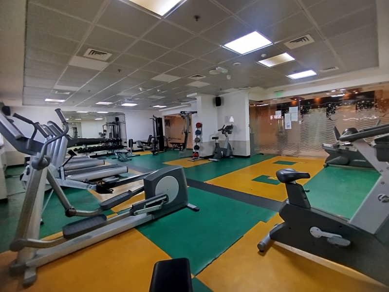 FULLY FURNISHED 2BHK CHILLER FREE FAMILY BLD PRIME LOCATION GYM POOL PARKING MAINTENANCE FREE