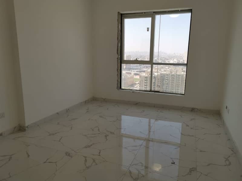 1 BHK Apartment in Oasis Tower for sale at the latest towers in ajman . with 7 years installments plan