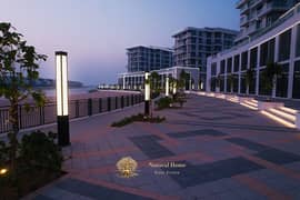 Prime Freehold Investment: 2BR Apartment with Private Beach Access