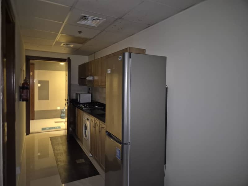 Elite 10 // Furnished Studio with Balcony