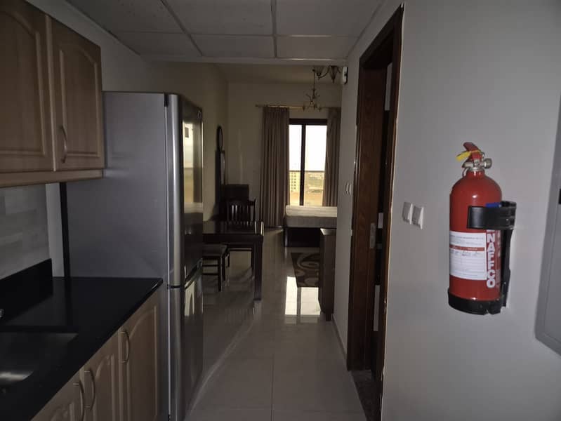 Elite 10 // Furnished Studio with Balcony