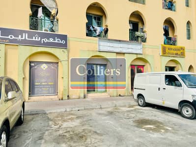 Shop for Rent in International City, Dubai - IMG_4750. jpeg