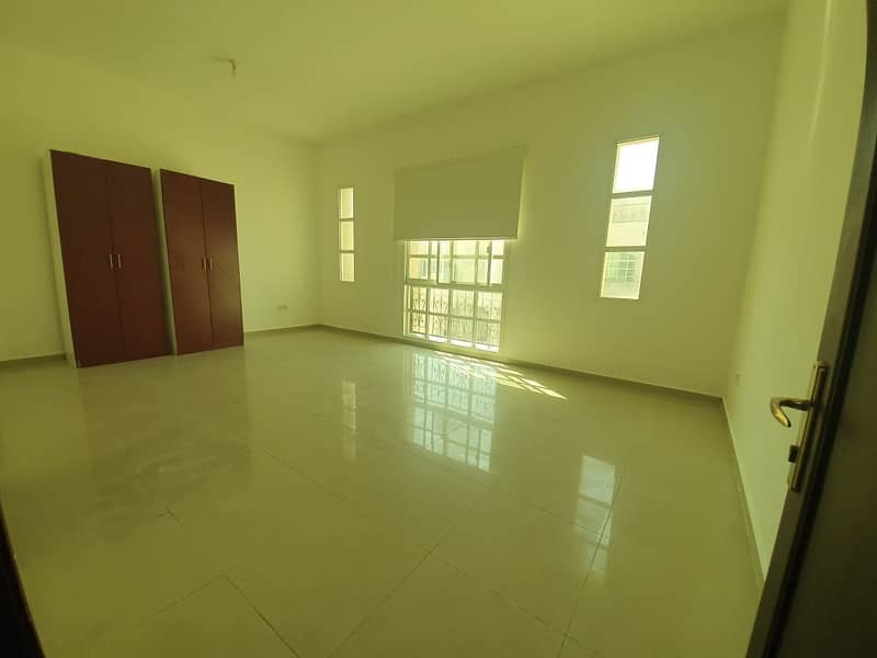 Lovingly Maintained Studio with Over looking View of Shared Pool inside Compound