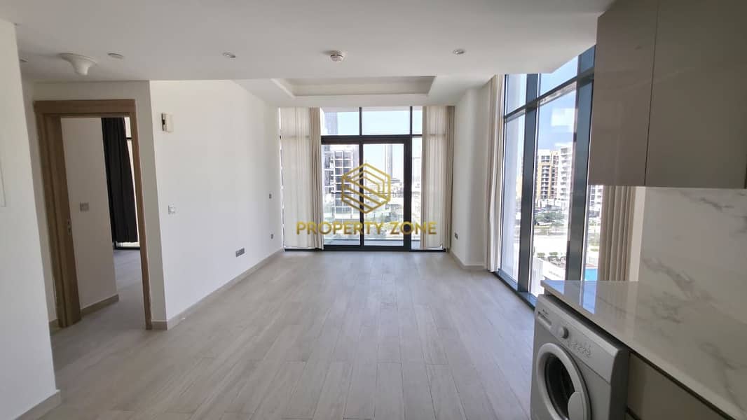 1BR Apartment | Azizi Riviera | Balcony | Community & Pool View