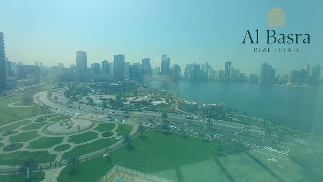 12 bright-office-with-large-windows-al-majaz-6. jpg
