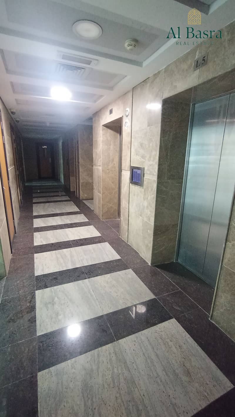 16 bright-office-with-large-windows-al-majaz-4. jpg