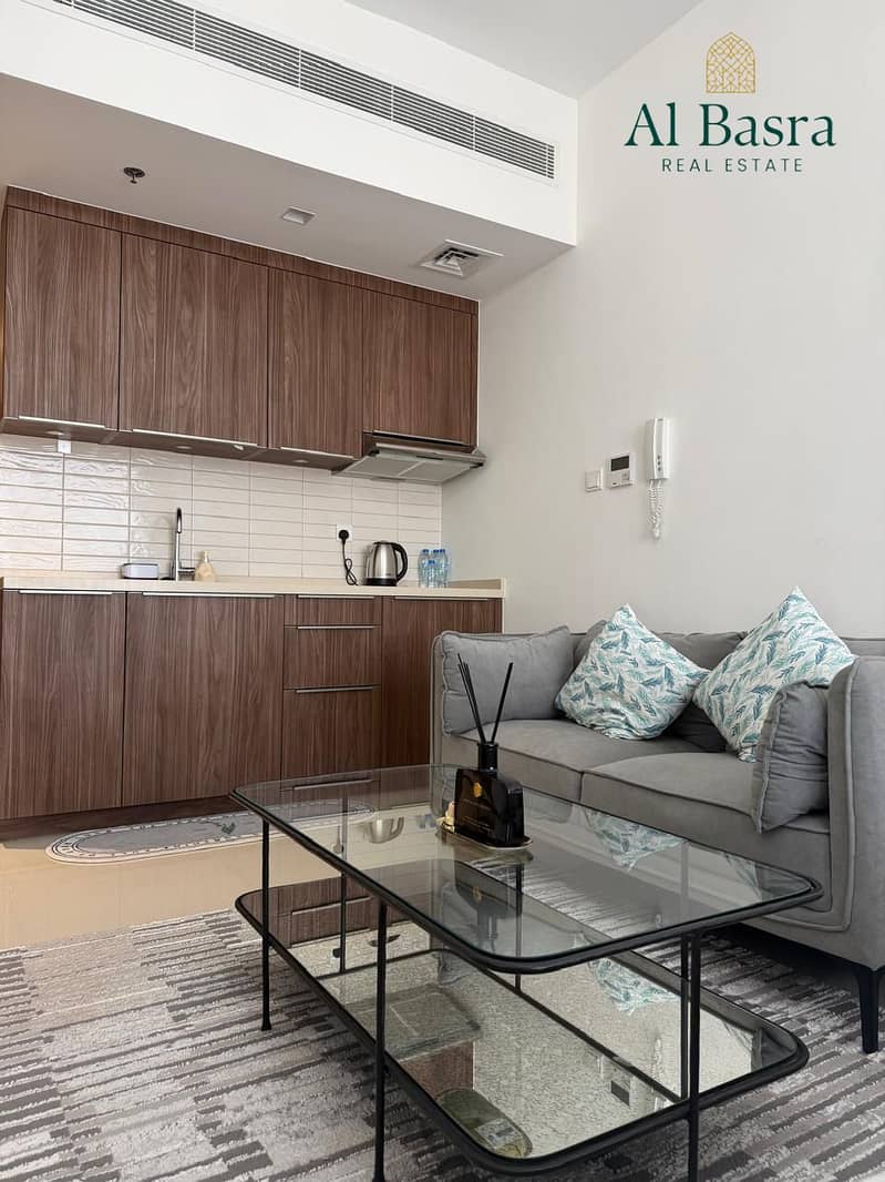 8 spacious-furnished-studio-living-uptown-al-zahia-2. jpeg
