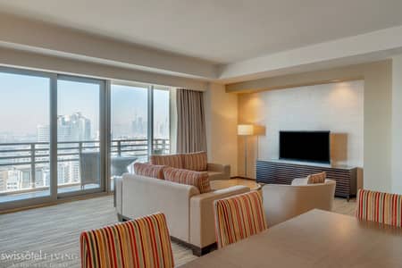 2 Camere Hotel Apartment in affitto a Deira, Dubai - H1P9_2_bedroom_apartment_living_room_with_view. jpg 2 Camere Hotel Apartment in affitto a Deira, Dubai - H1P9_2_bedroom_apartment_living_room_with_view. jpg