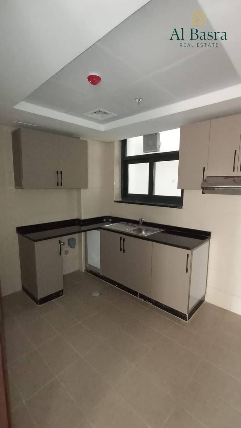9 modern-kitchen-cabinets-1bhk-al-zahia. jpeg