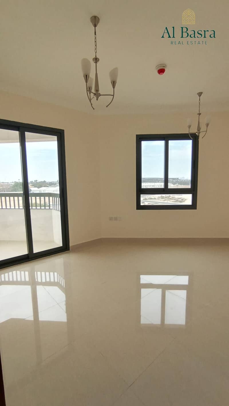 15 spacious-living-room-2br-apartment-al-zahia-2. jpeg
