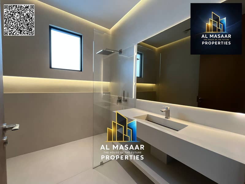 Villa for sale in Al Zorah, golf course complex, in the heart of nature, with a direct view of the lake and golf courses and a large area. - Image 11
