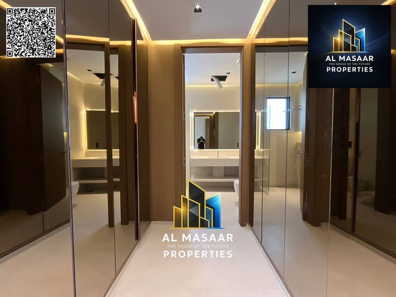 Villa for sale in Al Zorah, golf course complex, in the heart of nature, with a direct view of the lake and golf courses and a large area. - Image 12