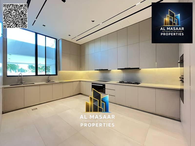 Villa for sale in Al Zorah, golf course complex, in the heart of nature, with a direct view of the lake and golf courses and a large area. - Image 14