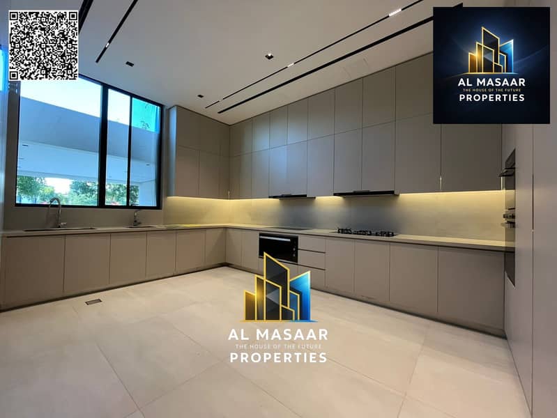 Villa for sale in Al Zorah, golf course complex, in the heart of nature, with a direct view of the lake and golf courses and a large area. - Image 15