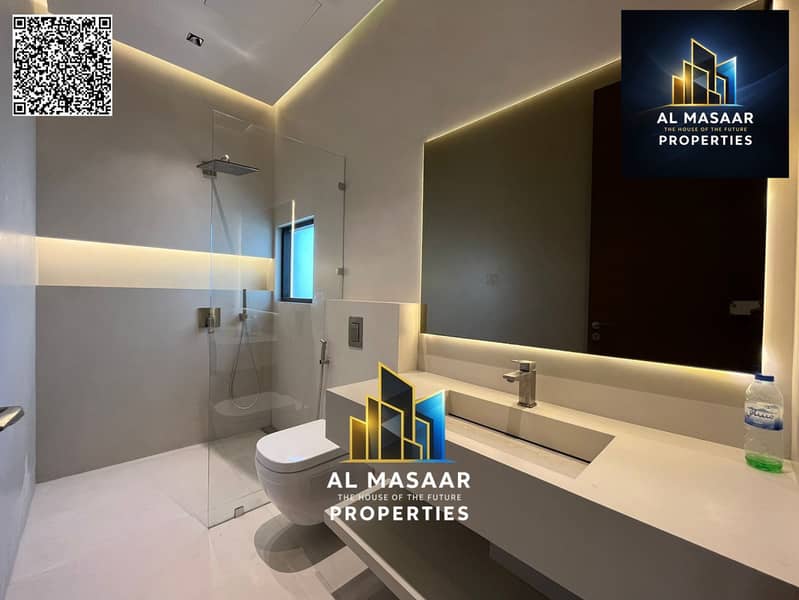 Villa for sale in Al Zorah, golf course complex, in the heart of nature, with a direct view of the lake and golf courses and a large area. - Image 20