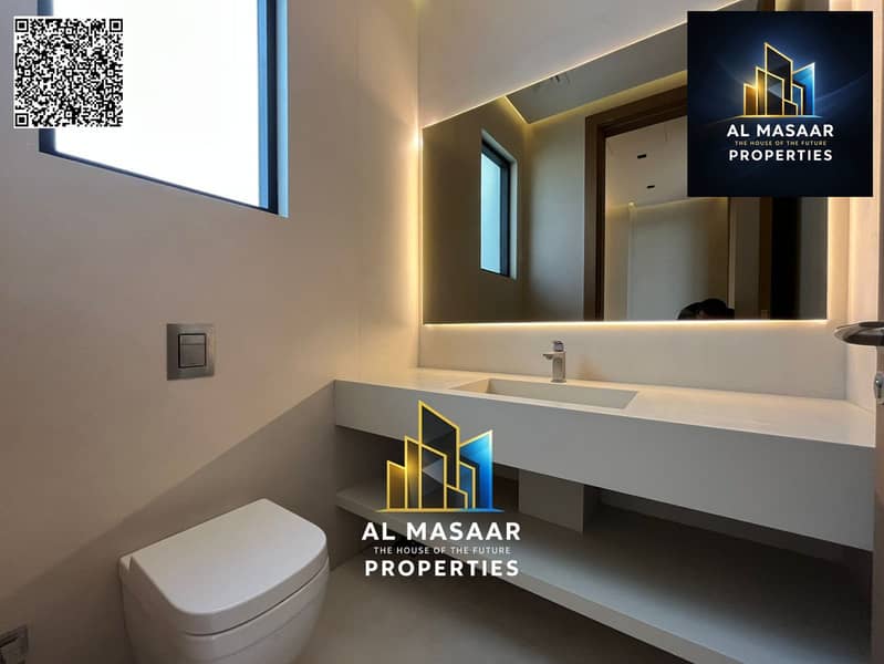 Villa for sale in Al Zorah, golf course complex, in the heart of nature, with a direct view of the lake and golf courses and a large area. - Image 21