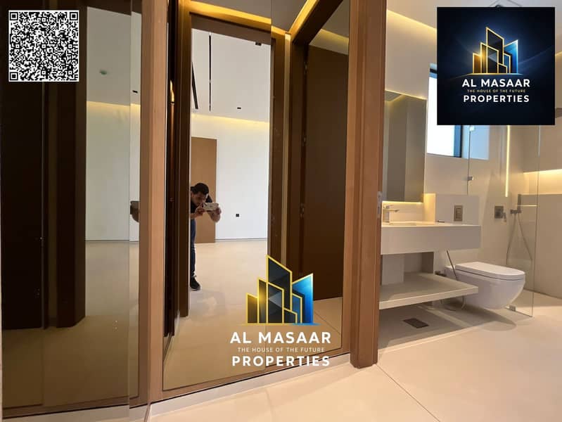 Villa for sale in Al Zorah, golf course complex, in the heart of nature, with a direct view of the lake and golf courses and a large area. - Image 22