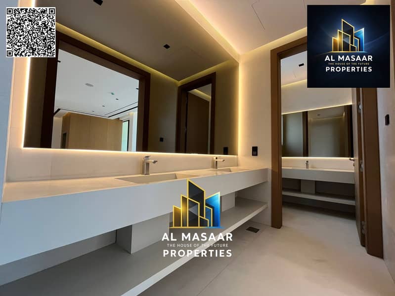 Villa for sale in Al Zorah, golf course complex, in the heart of nature, with a direct view of the lake and golf courses and a large area. - Image 24