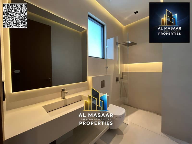 Villa for sale in Al Zorah, golf course complex, in the heart of nature, with a direct view of the lake and golf courses and a large area. - Image 25