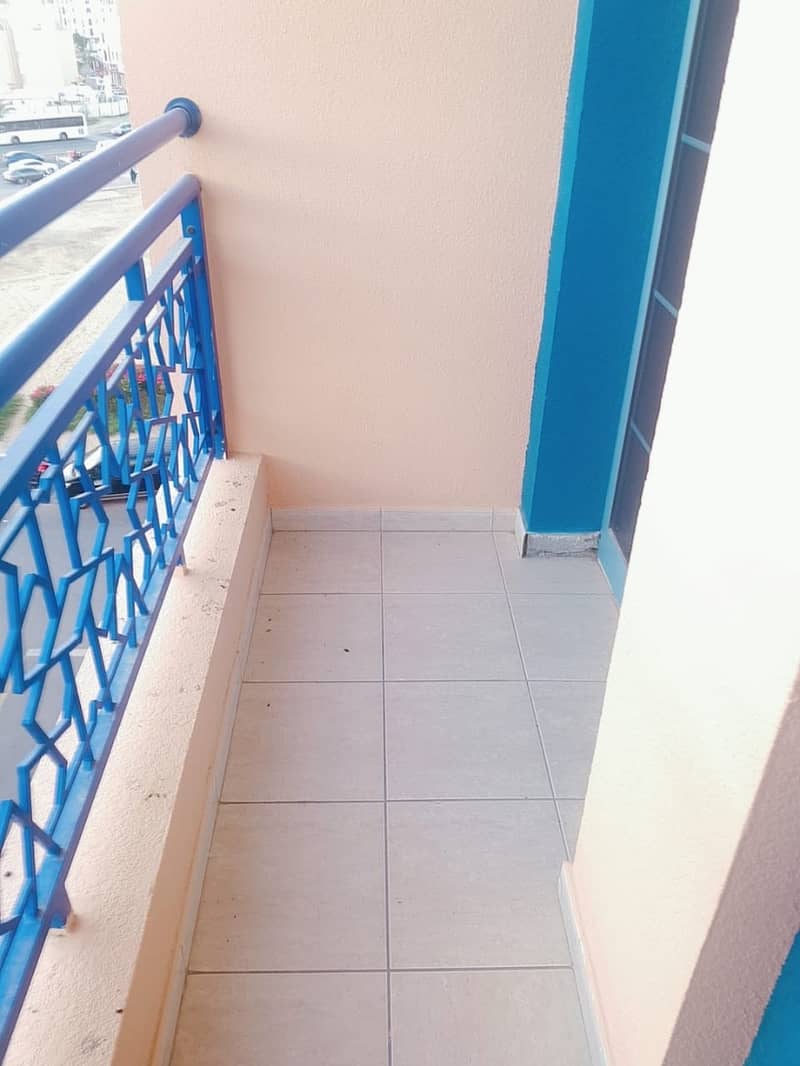 INTERNATIONAL CITY : STUDIO WITH BALCONY FOR RENT IN PERSIA CLUSTER ONLY IN 22,000/4
