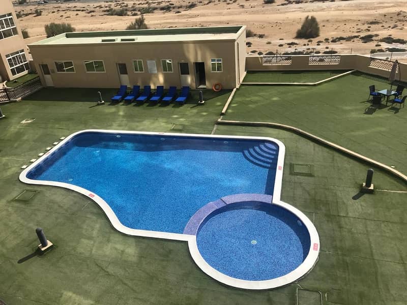 POOL VIEW 1 BEDROOM APARTMENT IN DUBAI SILICON OASIS RENT 46K IN 4 CHEQS