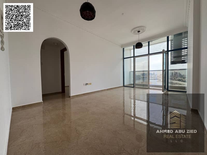 Elegant 1BR apartment in Mushairif with sea view, master room, hall, open balcony, kitchen, two bathrooms, and central AC.