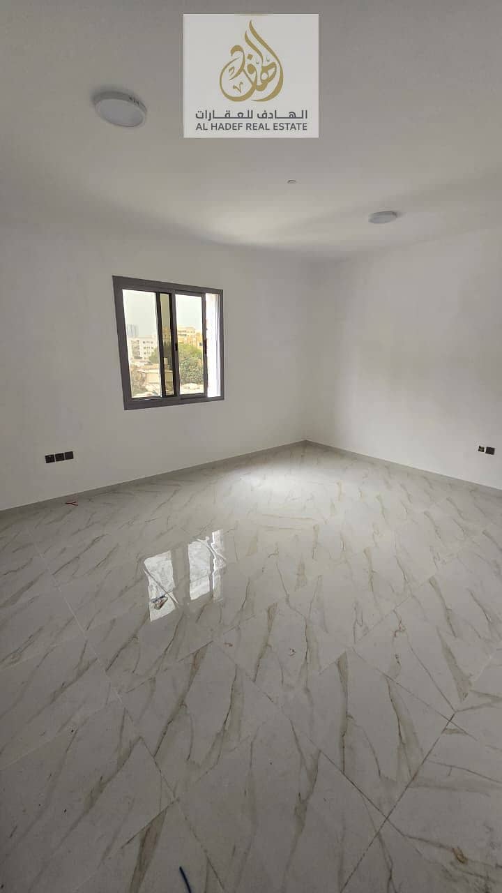 Al Nakheel, near Ajman Walk and Ajman Corniche - First occupancy - Studio with separate kitchen, spacious, excellent finishing - 25,000