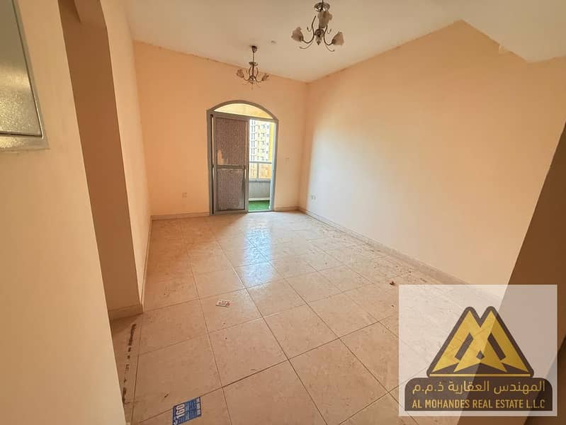 Two bedroom and living room apartment for yearly rent with balcony and open view in Al Nuaimiya 1 near Al Hikmah Private School easy access to Dubai