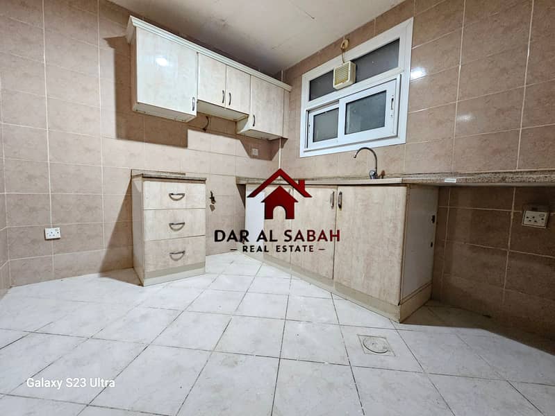 ONE MONTH FREE 1BHK CLOSE HALL WITH DOOR AT DUBAI SHARJAH BORDER FRONT OF DUBAI BUS STOP SAME LINE SAHARA CENTRE