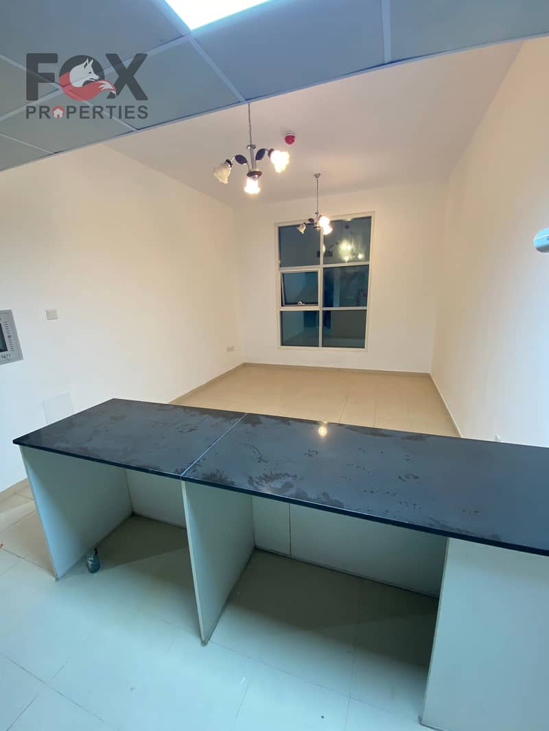 For yearly rent: 1 Bedroom and Living Room apartment in City Tower, Ajman. The apartment offers a spacious layout of approximately 900