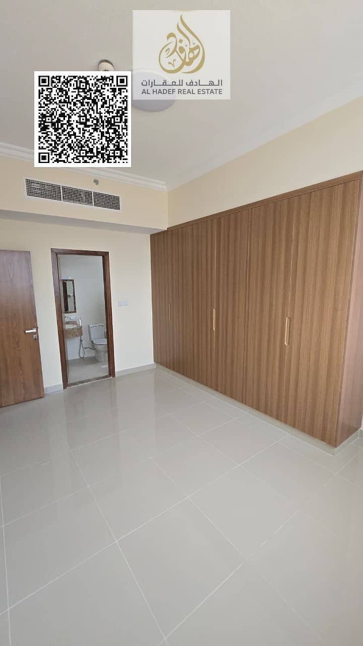 Two-bedroom apartment with a living room, first occupancy, with built-in wardrobes, very spacious, and super deluxe finishing.