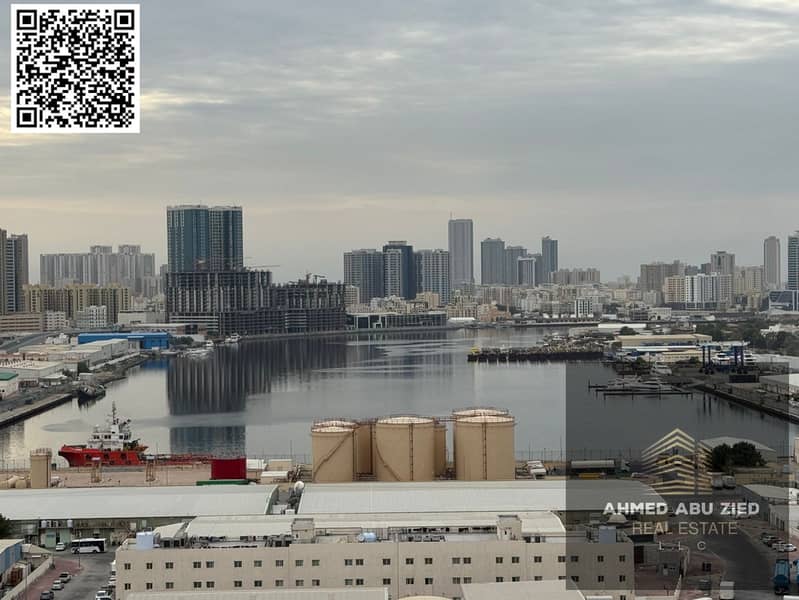 Luxury and spacious one-bedroom apartment with a living room, two bathrooms, central air conditioning, and a balcony with an excellent sea view. Super