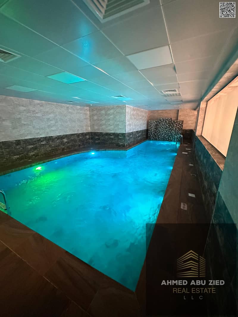 1month free gym & pool, 2BR hall apartment in Al Mowaihat 3: majlis, central AC, wall closets, great finish, prime location, payment facilities