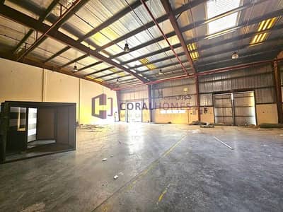 Warehouse for Rent in Dubai Investments Park (DIP), Dubai - Insulated Prime Warehouse At 9 Meters | 92.2 KW