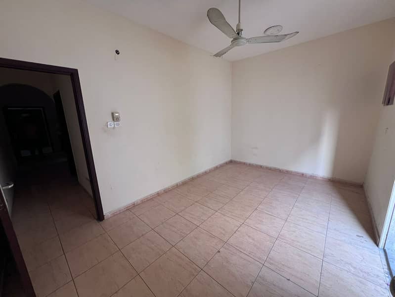 One Bedroom Apartment with Living Room and Balcony for Annual Rent in Al Rawdha 3 Ajman Directly on Sheikh Ammar Street Close to All Services