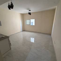 Brand new studio for annual rent in Al Jurf 3, Ajman, spacious layout, excellent design, central AC, great view, AED 22,000 in 6 payments.