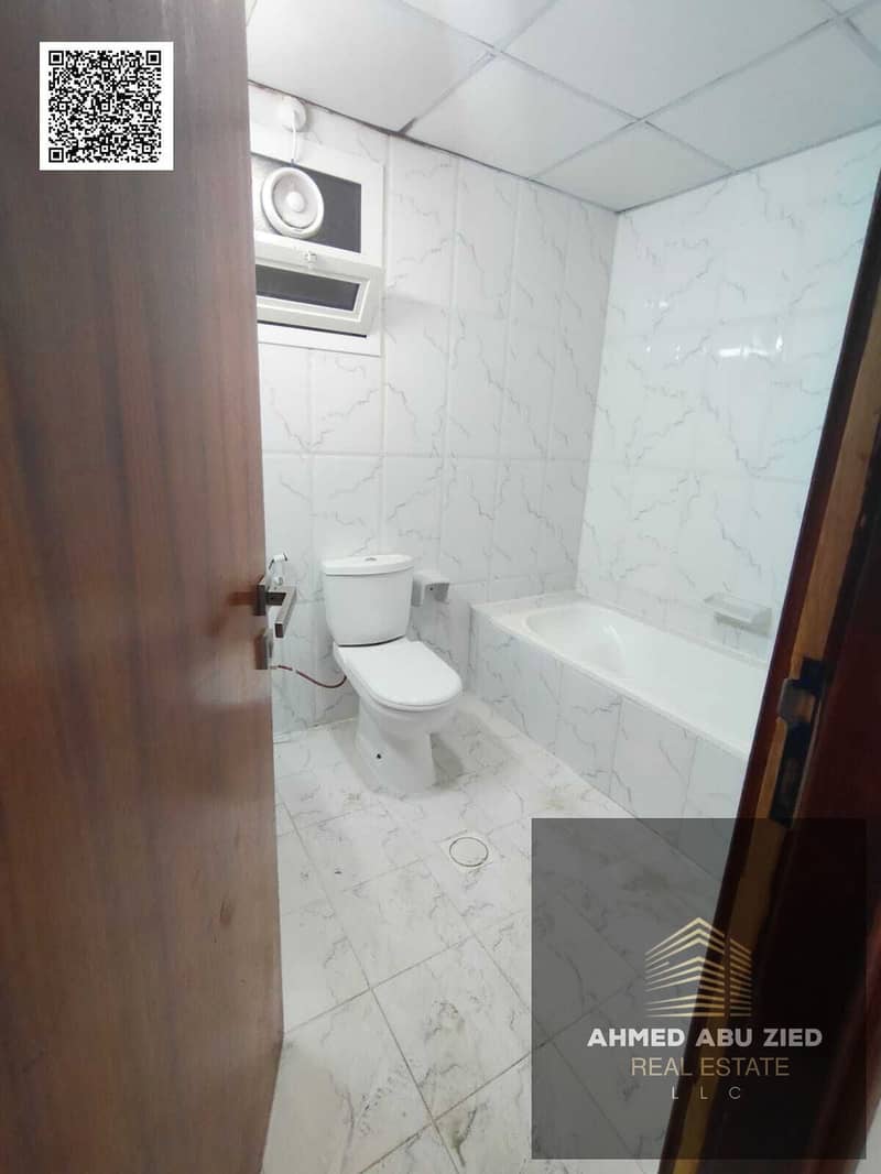 A spacious 3-bedroom apartment with a living room is available for annual rent in Emirates City. It boasts a direct, unobstructed view of Sheikh Moham