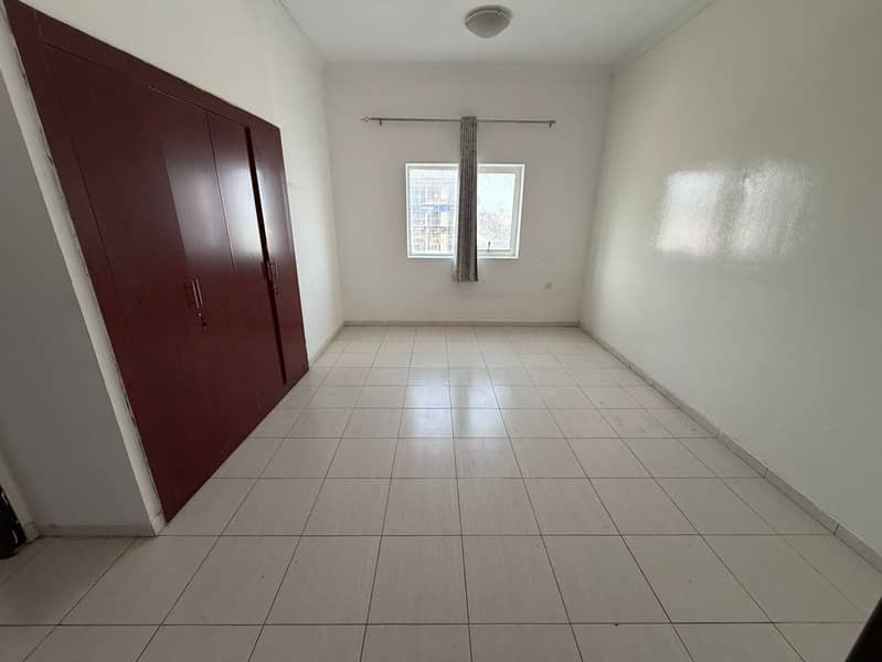 A fantastic opportunity for annual rent in Al Rashidiya 1, Ajman. This spacious two-bedroom apartment boasts a prime location right next to Nesto supe