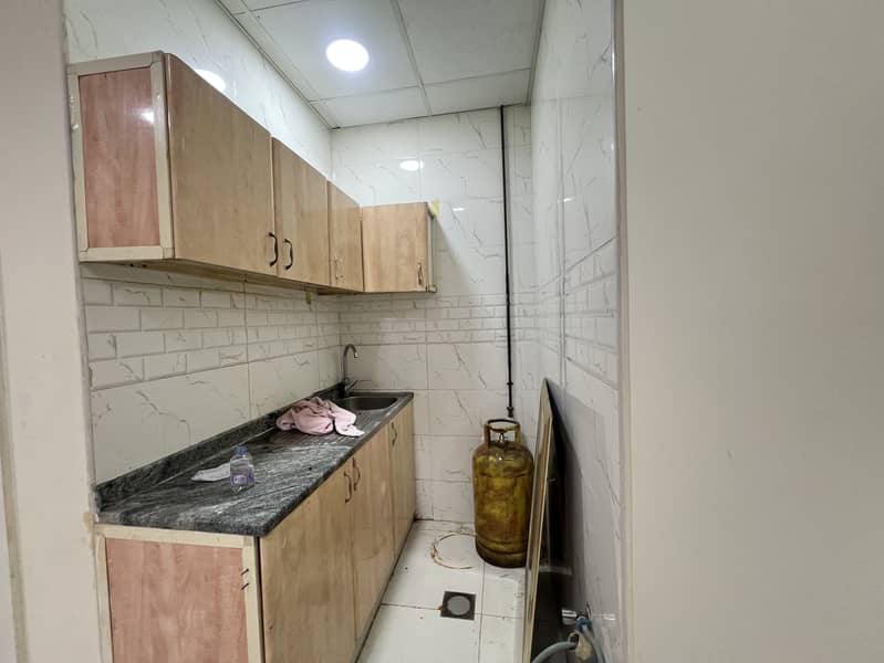 Close to muwaileh bus station studio just in 19k family building prime location