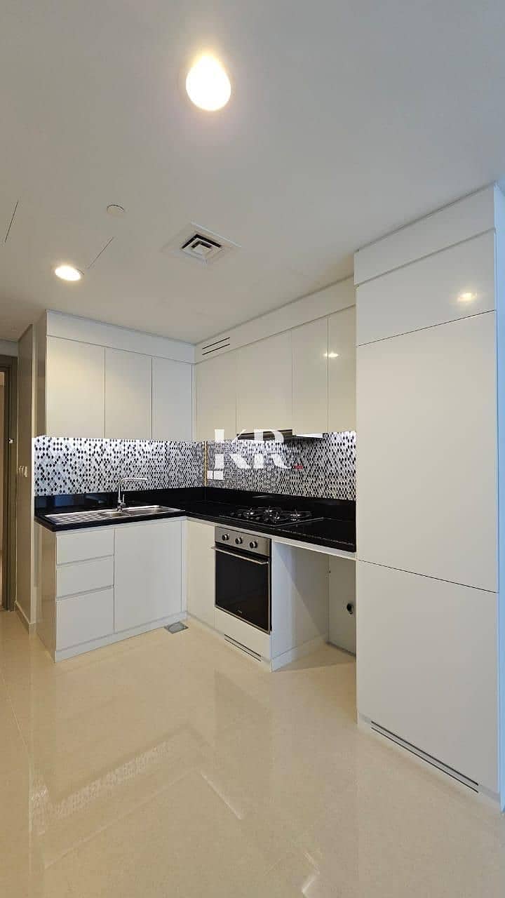 High-Floor 1BR | Aykon City Tower C | Multiple Views | Balcony & Pool Access