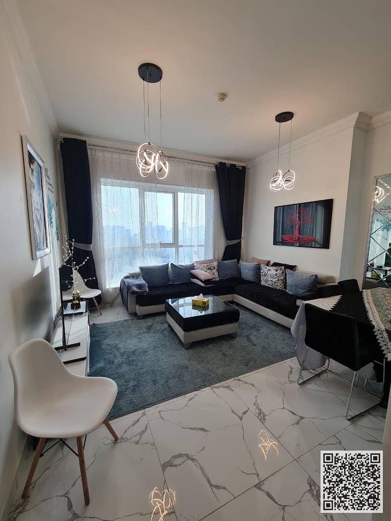 With an open view Furnished one-bedroom apartment for monthly rent in Ajman Includes bills and internet, with gym, pool, and parking