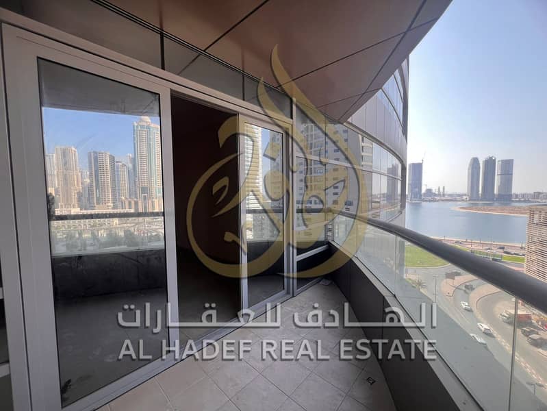 Distinctive apartment for annual rent in Al Taawun area Two bedrooms, a hall, a maid's room, a hallway, and a balcony with a beautiful view