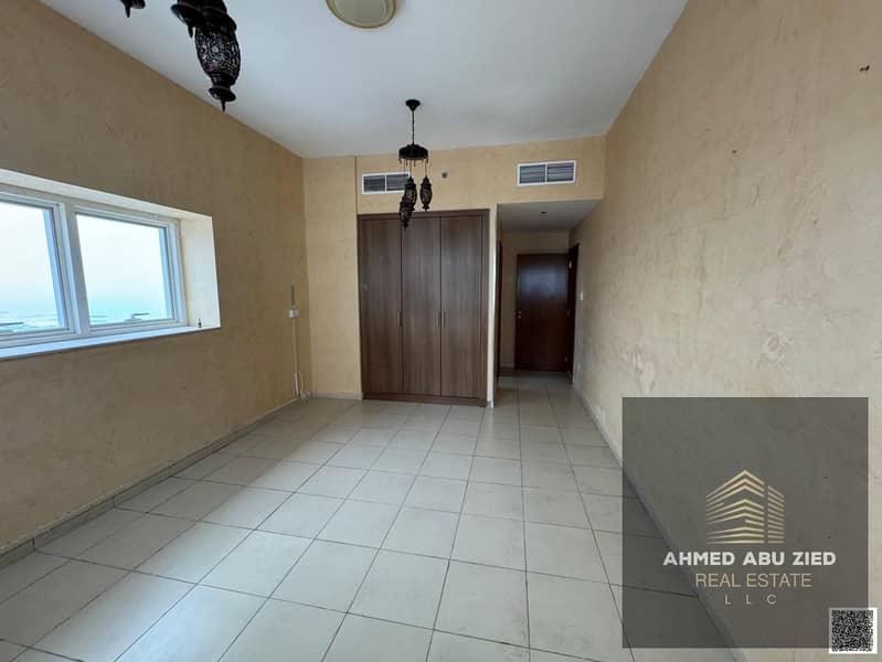 3-bedroom + maid room apartment for annual rent in Ajman, 3 bathrooms, spacious living room, balcony with glass view, gym & pool, near Corniche, peace