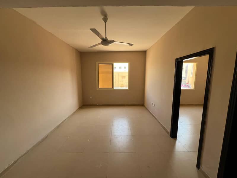 One bedroom and living room in Al Muwaihat, near McDonald's and the Saudi German Hospital. One bathroom. Central air conditioning. Families only. Pric